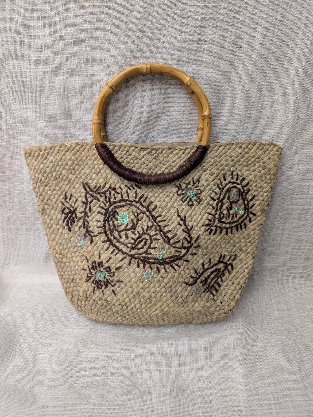 Woven Straw Embellished handbag with Round Bamboo Handles
